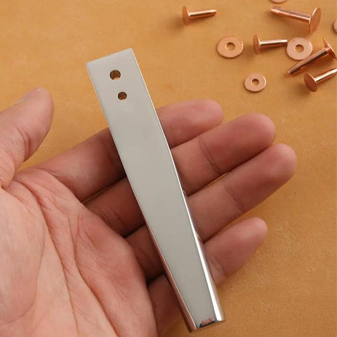 Copper Rivet Setter Tool 2 In 1 For Leatherworking Stainless Steel Burr Setter in hand with copper rivets on surface