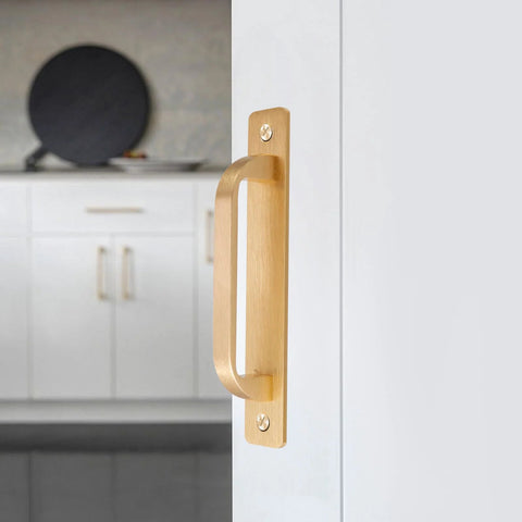 Close-up of 5-Inch Brushed Gold Cabinet Pulls With Base Plate Aluminium Alloy Square Kitchen Cabinet Handles Drawer Pulls installed on a door.