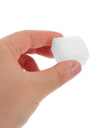 Hand holding white plastic Bed Rail End Caps 10 Pack 1.2x1.2 Inch Bedside Guardrail Bumper Covers Plastic Terminal Protectors for Bed Frames