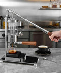 Top Shelf Manual Espresso Machine With 58mm Standard Filter Basket And Adjustable Pressure Gauge crafted from stainless steel, brewing espresso at home.