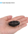 Hand holding Mod 1 42 Tooth Pinion Gear 8mm Bore Hardened Steel Spur Gear for RC Cars, outer diameter 44mm.