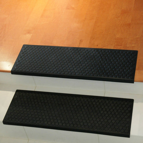 Coin Grip Grippy Non Slip Rubber Tread Stair Mats 6 Pack Black Easy Clean Durable Staircase Mats on wooden steps
