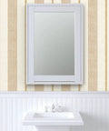 Rich Cream And Modern Gold Vinyl Wallcovering Boasts Subtle Leather Texture For Commercial Grade Heavy Duty Wear And Gets Custom Printed Just For You To Spark A Major Room Glow Up Today on bathroom wall with mirror.