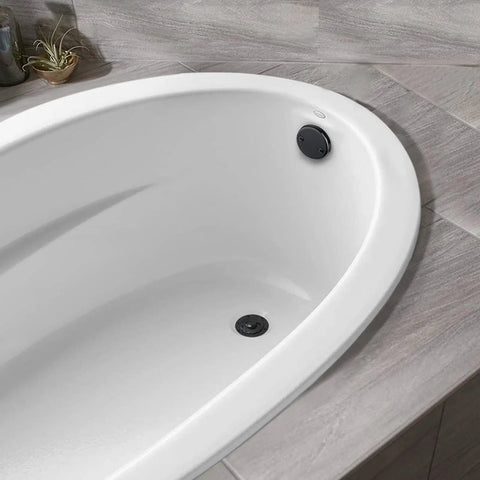 Matte Black Lift and Turn Tub Drain Stopper Kit With Two-Hole Overflow Faceplate No-Putty Gasket installed in white bathtub