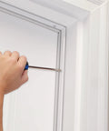 Installing White Aluminum And Vinyl Door Seal Kit With Screw On Top And Sides Blocks Drafts Moisture Dust And Insects