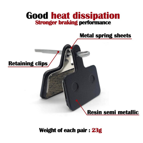 Close-up of resin semi-metallic bike disc brake pads with retaining clips and metal spring sheets. Four Pairs Disc Brake Pads For Bikes Resin Semi Metallic Replacement High Performance Front And Rear Pads Compatible With M315 M355 M515 M525 C501 C601 M375 M395 M415 M416 M446 M465 M475 M485 M486 Black