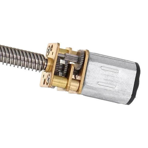 Rock Solid Mini Gearmotor With T5 Lead Screw Shaft Runs On 3V 6V Or 12V DC Ultra Quiet Low Speed Thread Reducer showing internal gears and threaded shaft.