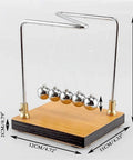 Hands On Newton Collision Ball Pendulum Lab Kit For Momentum And Kinetic Energy Conservation, metal balls on wooden base.