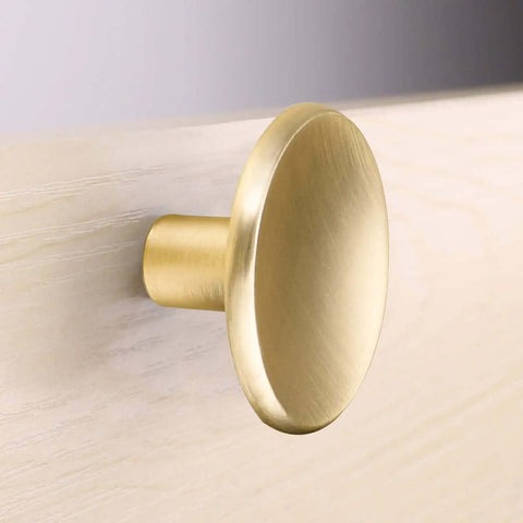 Premium Quality Gold Cabinet Knobs For Modern Kitchen And Bedroom Drawers Durable Zinc Alloy Furniture Handles Boasting No Sweat Installation Steps For A Swanky Home Renovation Refresh, close-up view of brushed gold knob.