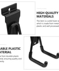 Close-up of Badass Heavy Duty Black Metal Wall Hanger Hooks, showcasing metal and plastic construction for durable storage.