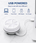 USB powered 2-in-1 Mini Ultrasonic Washing Machine Portable Turbo Washer connected to a laptop.