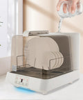 Portable Countertop Dishwasher Compact For Apartments And RV Trips featuring water being poured into the unit for hot wash.