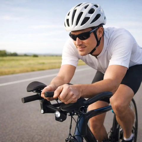 Cyclist using Triathlon T Handlebar Aerobars For Road Bikes With Beefy Aluminum Alloy Build Rest Pads And Cushions on open road