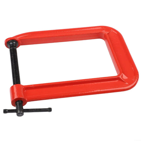 Massive 110mm Jaw G Clamp With Deep Throat For Welding And Woodworking Projects Made From Durable Cast Iron Rust Resistant Orange Finish Heavy Duty C-Clamp For Gluing And Assembly Tasks No Sweat Guarantee - Side view of the clamp showcasing its red-colored body and threaded screw.