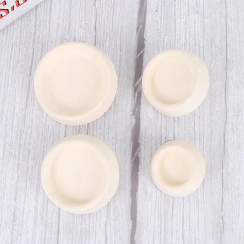 4pcs Rubber Drain Plug with Hanging Ring for Basin and Bathtub, assorted sizes, off-white color for effective sink drainage.