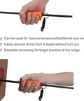 Hand holding Orange Archery Arrow Puller Gripper With Belt Clip Two Pack Grab And Go Soft Molded Handle Anti Skid Grip