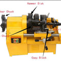 Beefed Up Electric Pipe Threader Machine With One Half To Two Inch NPT And BSPT Dies, showing chucks and controls for threading tasks.