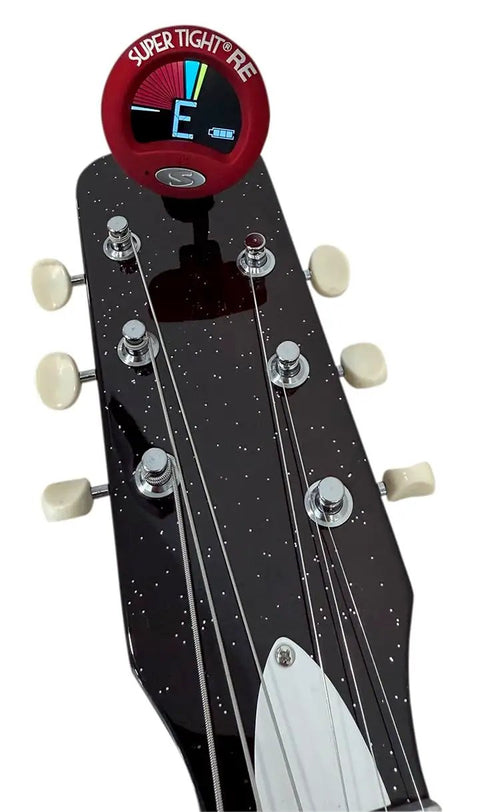 ST-2 Multi Instrument Chromatic Tuner With Rechargeable Battery And Eco Friendly Design attached to a guitar headstock