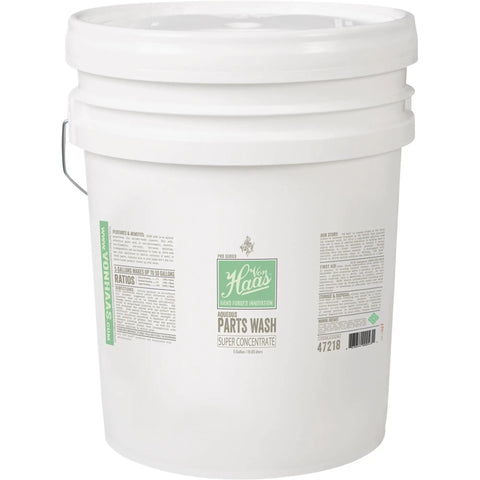 Top Tier Five Gallon Water Based Parts Washer Fluid That Hits Hard On Tough Shop Gunk While Keeping Your Heavy Steel Components Rust Free And Ready To Roll in a white bucket.