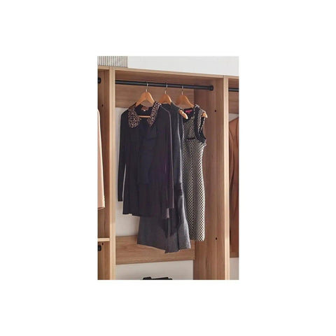 Custom Walk In Closet System With Sturdy Wooden Drawers And Flexible Shelves Modular Wardrobe Organizer Featuring Hanging Rods and dresses hung up.
