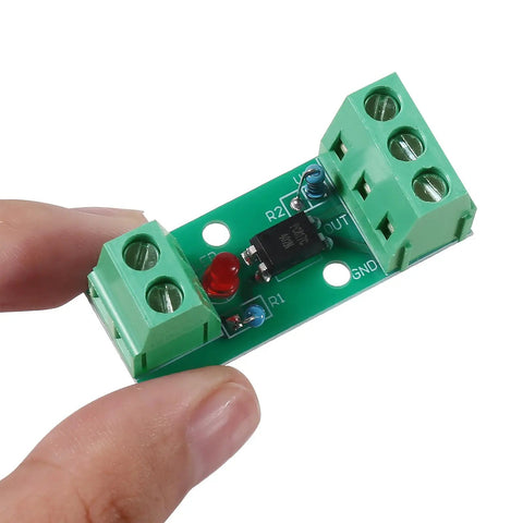 Close-up of One Channel PC817 Optocoupler Isolation Module for PLC drives and motor control, rail mount, dual green terminal blocks visible.