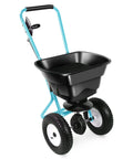 Walk Behind Broadcast Spreader With 80 Lb Capacity For Fertilizer Salt Ice Melt Grass Seed And Lawn And Garden Care Pro Grade Heavy Duty With Side Spread Control For Precise Coverage. Black hopper and blue frame.