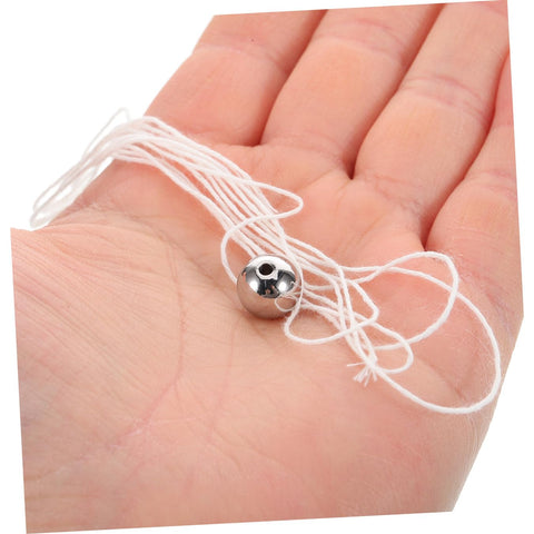 Close-up of a steel ball and string from Cradle Pendulum Physics Kit For Classroom And Lab Use With Innovative Design.