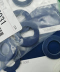 Oil Drain Plug Gasket Set And Crush Washer Replacement For Toyota, Aluminum 0.82 Inch Outer Diameter 0.47 Inch Inner Diameter 0.07 Inch Thick, 10 Pack Replaces 90430-12031, Durable Automotive Seal blue aluminum washers in a bag