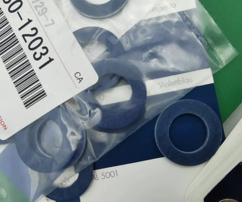 Oil Drain Plug Gasket Set And Crush Washer Replacement For Toyota, Aluminum 0.82 Inch Outer Diameter 0.47 Inch Inner Diameter 0.07 Inch Thick, 10 Pack Replaces 90430-12031, Durable Automotive Seal blue aluminum washers in a bag