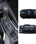 Electric Parking Brake Actuator Switch Driver Side For Toyota Corolla 2019 To 2023; close-up of buttons next to gear shift.