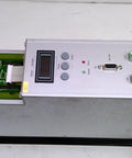 Compax M 1560M Compact Servo Controller For Precision Motion And Automation, Used Good Condition, 18.67 Lb Weight, 22 X 6 X 16 Inch Dimensions, High Efficiency Servo Drive For CNC Machines And Robotic Systems. silver metal servo controller with green terminal blocks