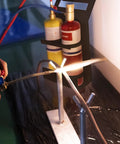 Oxygen MAPP Pro Grade Torch Kit with Portable Stand for Soldering Brazing, showing nozzle and flame in use, cylinder in background