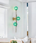 Dope Gold Long Strip 3 Light Globe Vanity Wall Sconce With Green Glass Shades Minimalist Mirror Bathroom Lighting in living room