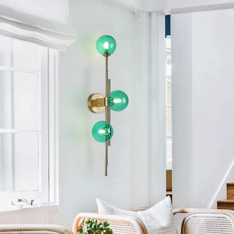 Dope Gold Long Strip 3 Light Globe Vanity Wall Sconce With Green Glass Shades Minimalist Mirror Bathroom Lighting in living room