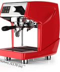 Red espresso machine with dual spouts, black handle, and control panel, shown on a white background with dimensions labeled.