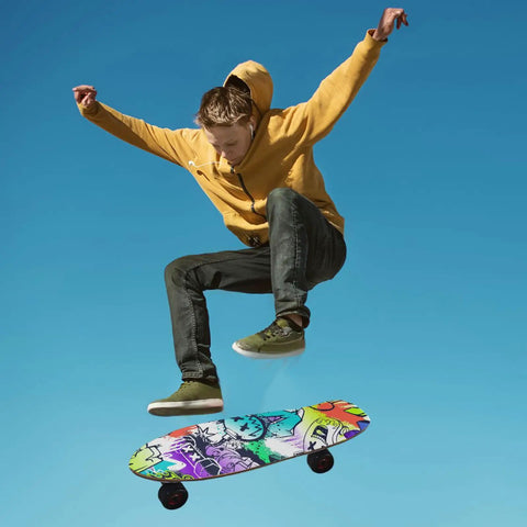 Skateboarder mid-air showing Street Art Graffiti Grip Tape For Skateboards And Longboards, Bubble Free Anti Slip Deck Sheet 33 X 9 Inches