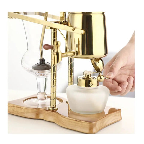 Top Shelf Siphon Coffee Maker serving up smooth brews with heavy duty glass and classic retro styling in action.
