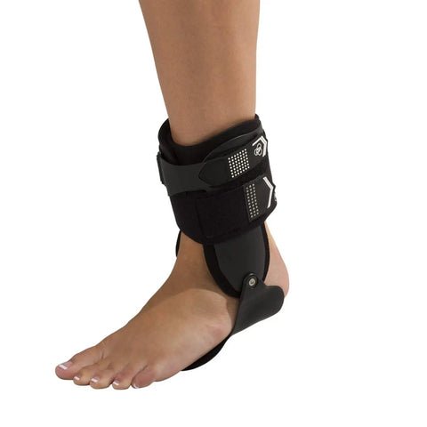Bionic Stirrup Ankle Brace for Left Foot Large Size with Rigid Uprights and Low Profile Footplate in black on foot