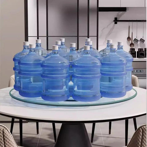 40 Inch Rotating Lazy Susan Turntable Made From Tempered Glass with water bottles, round serving tray for hotels and restaurants.