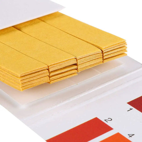 Stack of yellow All In One pH Test Strips Kit 1 To 14 Indicator Paper for Water Food Pool Aquarium Spa Lab Use 80 Tests with Color Chart