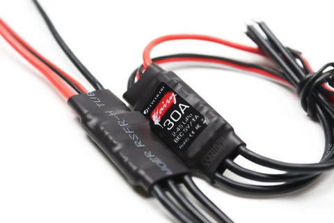 Close-up of 30A Brushless ESC For 2-4S RC Drones Quadcopters And Airplanes With 5V 1A BEC Built In MCU OneShot125 Ready.