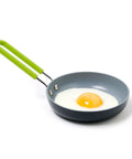 Mini Healthy Ceramic Nonstick Egg Pan Five Inch Round With Stay Cool Handle PFAS Free Dishwasher Safe Easy Cleanup shown with fried egg