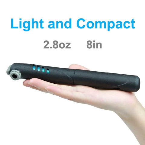 Person holding compact black mini pump from 16 In 1 Bike Repair Kit With Mini 120 Psi Pump Tire Patch Levers Wrench And Valve Tools Portable Pouch Bag.