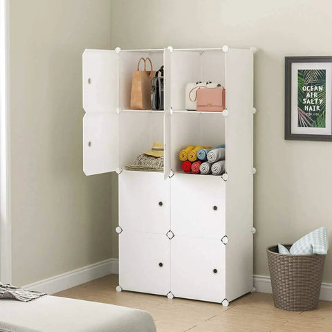 Eight Cube Storage Organizer In White 28 Inch Wide By 18 Inch Deep By 56 Inch Tall Closet And Toy Organizer in bedroom.