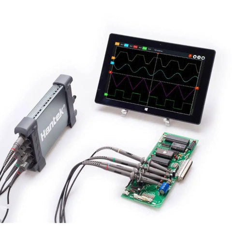 Automotive USB Oscilloscope 6074BE Kit I II III IV with display and connected circuitry showing real-time waveform capture.