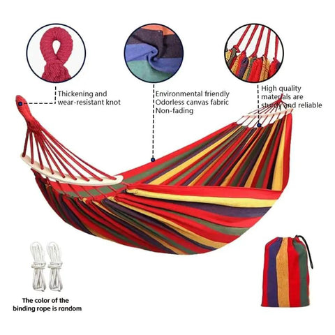 Rainbow Cotton Canvas Hammock With Tree Straps And Bar, Ultra Comfy Durable Fabric That Conforms To Your Body, Supports Up To 440 Lbs, Includes Travel Bag For Camping Outdoor Or Indoor Patio Backyard Hangout with colorful stripes displayed alongside tree straps and travel bag.