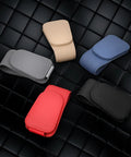 Heavy Duty Magnetic Sunglass Holder For Car Sun Visor With Secure Snap Clip And Soft Leather Wrap, shown in assorted colors on a black background.