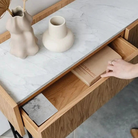Open wooden drawer revealing a partially filled compartment, illustrating use with 100 Piece Plastic Drawer Wedges With Screws Set For Sagging Drawer Bottom Repair Includes Plastic Angle Code Bracket Fasteners And Mending Wedges For Easy Cabinet And Furniture Fixes.