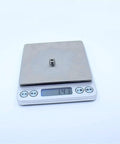 Heavy Duty 603ZZ And 603Z Miniature Ball Bearings Featuring Super Smooth ABEC-1 Ratings on a scale, weighing 1.43g.