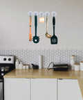 Kitchen utensils hanging on a wall using three size suction cup hooks set for shower glass and walls with mega strong hold up to seven pounds